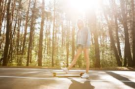 Close-up of a person holding a difficult balancing yoga pose with concentration.