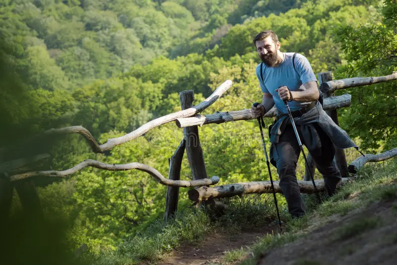 Person sitting in a meditative pose at the end of a yoga session.